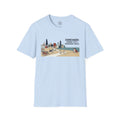 Light blue 100% cotton t-shirt from 4 Paws Society featuring a Chicago skyline graphic with dogs playing on a beach.