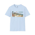 4 Paws Society light blue 100% cotton t-shirt with a graphic of the Los Angeles skyline, palm trees, and dogs on a beach.
