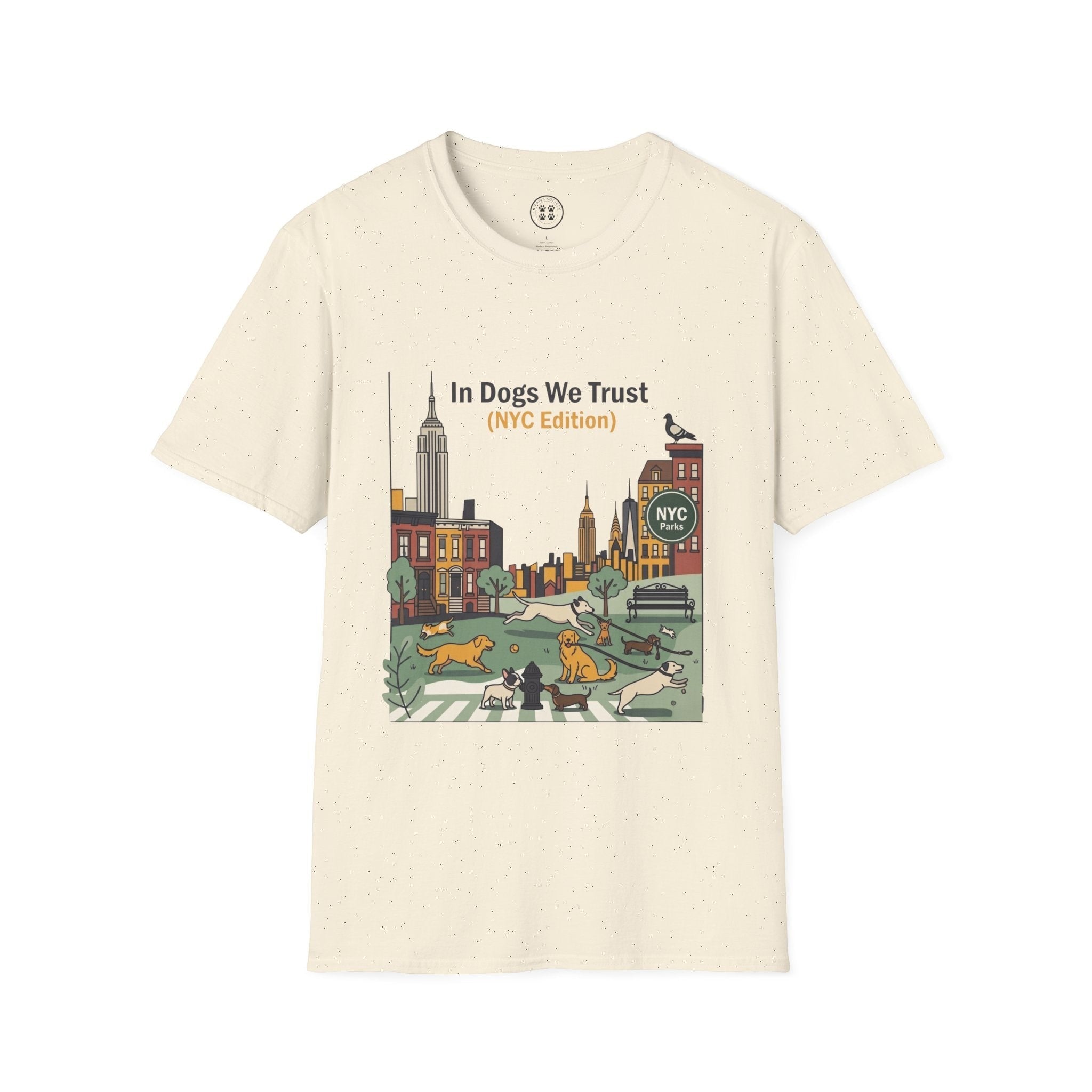 4 Paws Society cream 100% cotton t-shirt with "In Dogs We Trust NYC Edition" graphic featuring dogs playing in a park with NYC skyline.