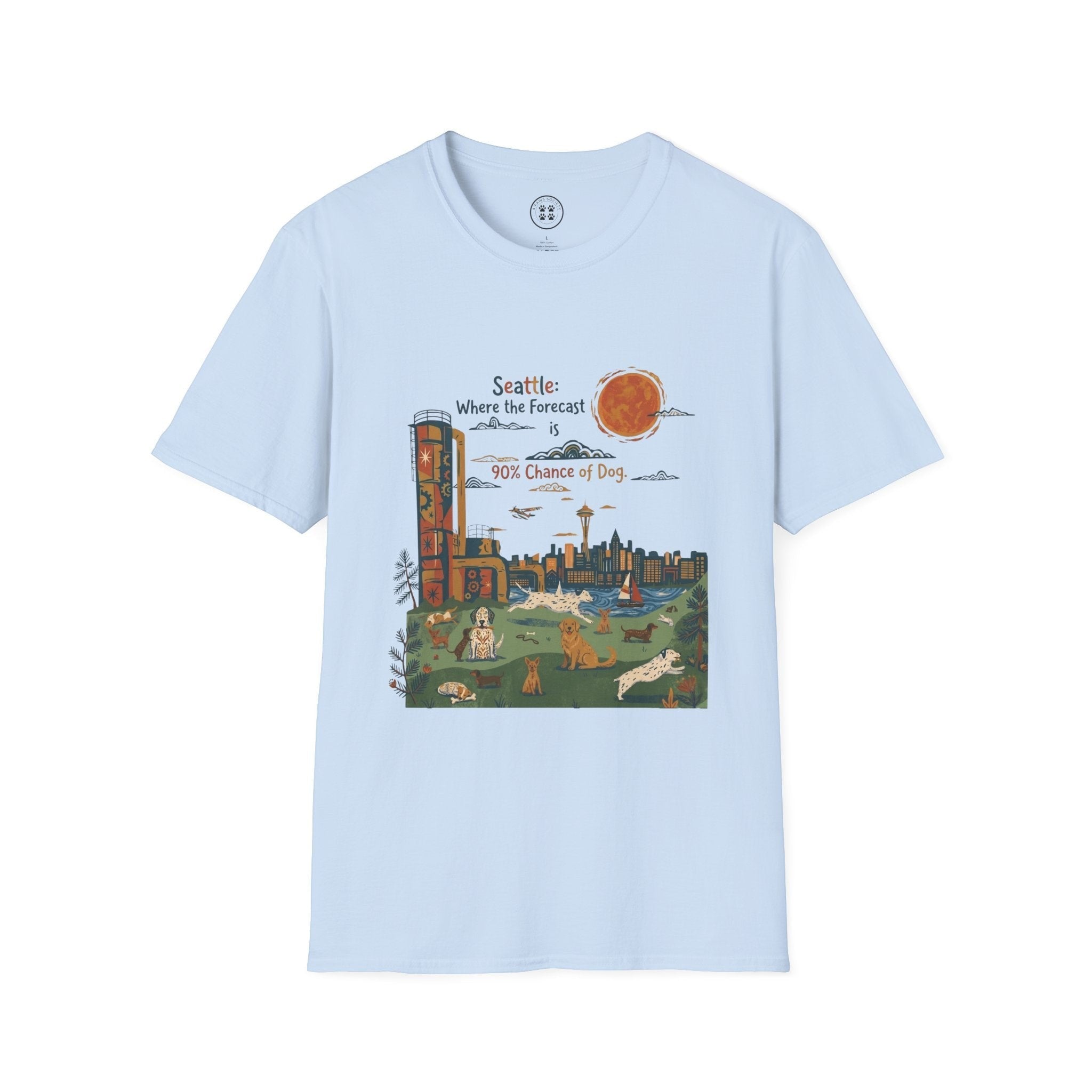 4 Paws Society light blue 100% cotton t-shirt with Seattle cityscape and dogs graphic, featuring Space Needle and text 'Seattle: Where the Forecast is 90% Chance of Dog.'